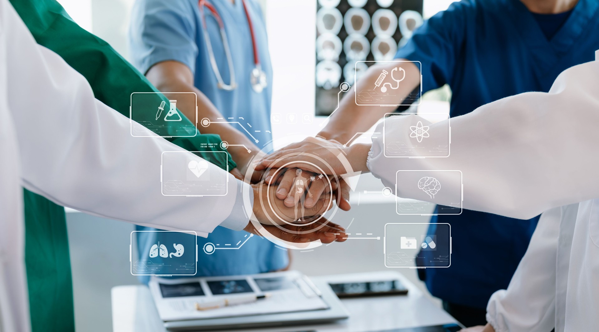 Medical technology network team meeting concept. Doctor hand working with smart phone modern digital tablet and laptop computer with graphics chart interface, with virtual icon