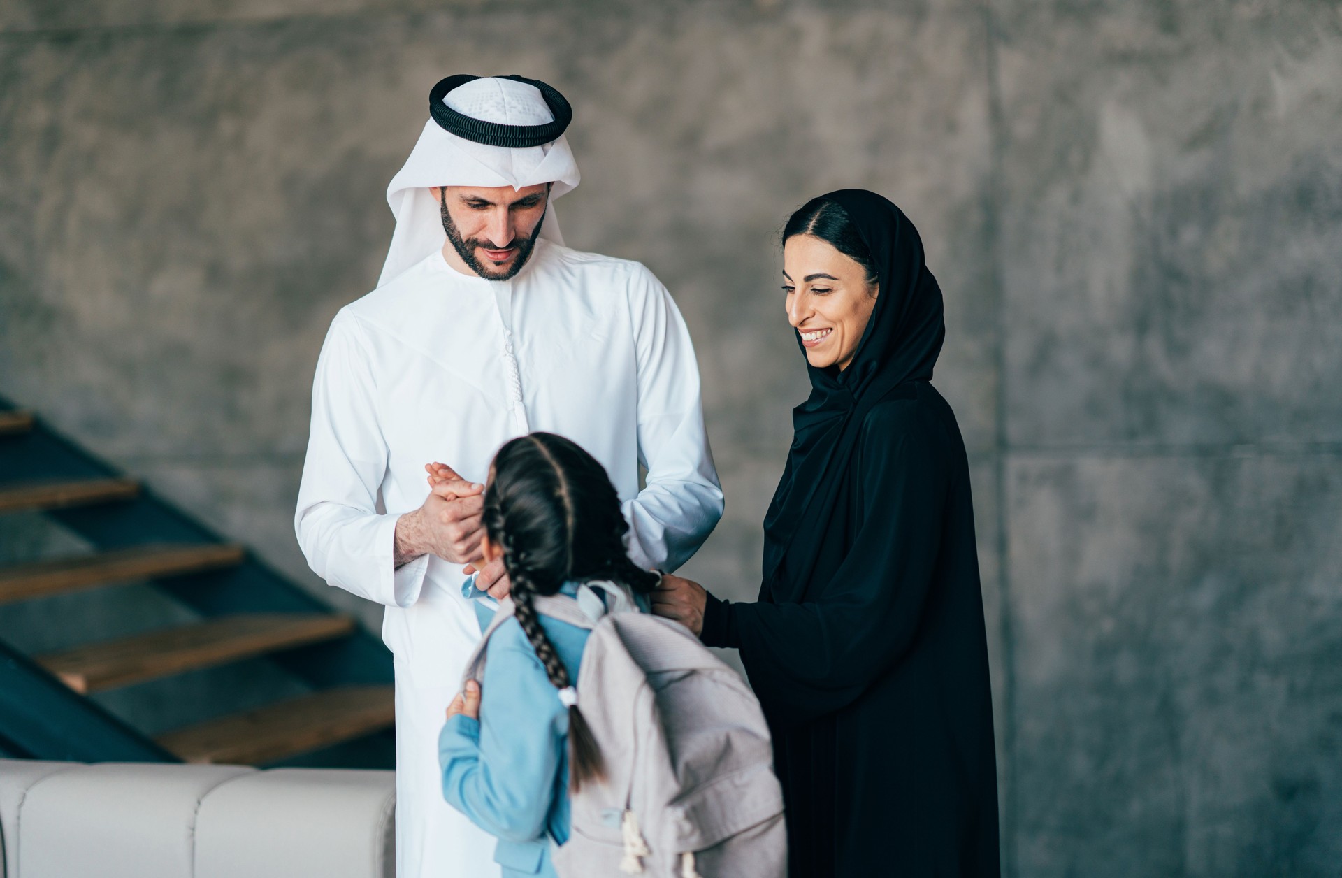 Traditional arabian family from Dubai spending time together at home